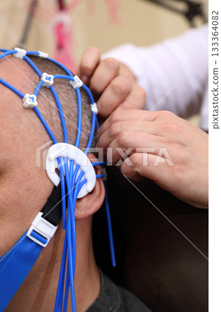 Electroencephalography (EEG) procedure. A noninvasive medical test that measures the brain's electrical activity. 133364082