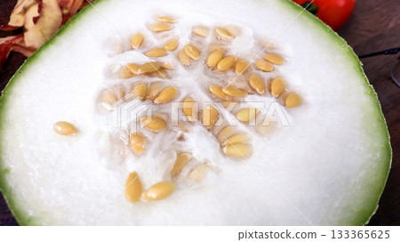 Closeup of Fresh half-cut kaddu. suitable for food, vegetable, and cooking concept images. 133365625