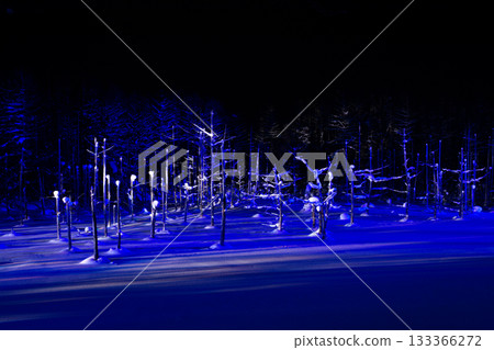 Illuminated winter blue pond Biei Town 133366272