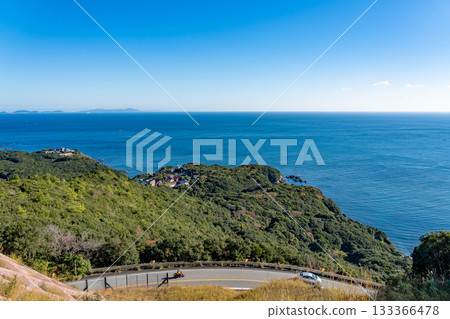Toba City, Mie Prefecture Morning view of the Sea of Ise from Toba Observatory and cars driving along Pearl Road Toba City, Mie Prefecture Morning view of the Sea of Ise from Toba Observatory and cars driving along Pearl Road 133366478