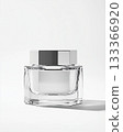 Isolated image of a cosmetic cream jar and bottle, sleek glass containers with smooth cream texture, beauty and skincare theme, elegant and minimalistic design, white background 133366920