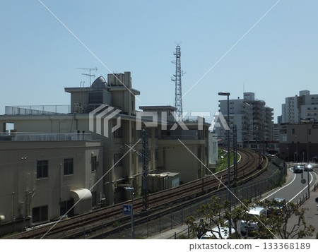 Curving railway tracks in front of Sagami-Ono Station 133368189