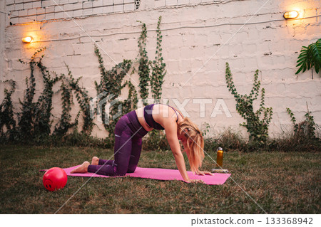 Mother embraces fitness journey with outdoor exercise after childbirth Mother embraces fitness journey with outdoor exercise after childbirth 133368942