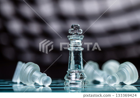 glass chess board game in black background ,selective focus on King, leadership concept glass chess board game in black background ,selective focus on King, leadership concept 133369424