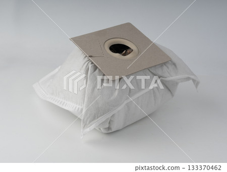 Used, dirty vacuum cleaner bag or sack full of dust and garbage Used, dirty vacuum cleaner bag or sack full of dust and garbage 133370462
