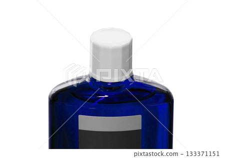 A blue translucent bottle of hair growth product with a screw cap A blue translucent bottle of hair growth product with a screw cap 133371151