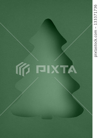 Stylized Christmas Tree Cutout on Layered Green Paper Stylized Christmas Tree Cutout on Layered Green Paper 133371736