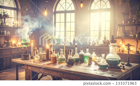 old wooden table with burning candles and tea 133371963