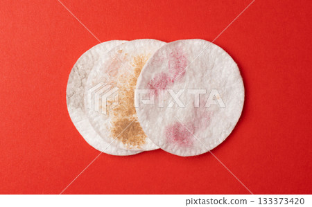 Dirty Cotton Pads, Makeup Removal, Used Cotton Disks after Makeup Cleansing, Removing Make Up 133373420
