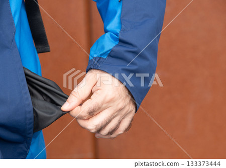 Empty pockets close-up. Person is showing financial loss, no money, poor person Empty pockets close-up. Person is showing financial loss, no money, poor person 133373444