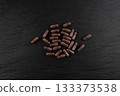 Iron capsule, Fe pills, dark red hemoglobin supplement tablets, vitamin capsules, mineral 133373538