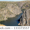 Majestic Rocky Canyon with Serene River View 133373557