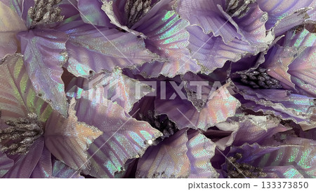 Iridescent purple holiday flower macro. Silver glitter and shimmer festive texture background 133373850