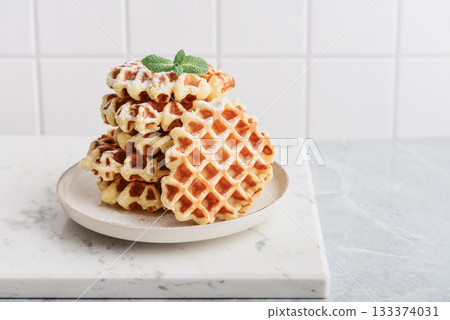 Stack of fresh homemade waffles Stack of fresh homemade waffles 133374031