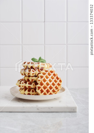 Stack of fresh homemade waffles Stack of fresh homemade waffles 133374032