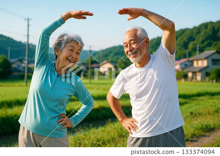 A healthy senior couple doing stretching exercises in nature 133374094