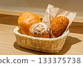Delicatessen bread and sweet bread lined up in a basket 133375738