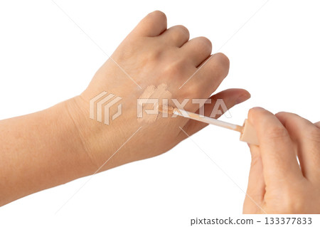 Foundation cream smear isolated. Cosmetic concealer textured swatch, skin tone cream Foundation cream smear isolated. Cosmetic concealer textured swatch, skin tone cream 133377833