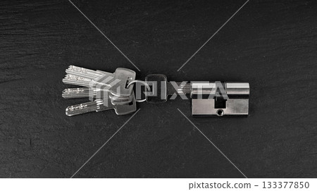 Keys and lock cylinder for door lock. Pin tumbler components ready to replace or repair Keys and lock cylinder for door lock. Pin tumbler components ready to replace or repair 133377850