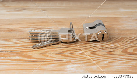 Keys and lock cylinder for door lock. Pin tumbler components ready to replace or repair Keys and lock cylinder for door lock. Pin tumbler components ready to replace or repair 133377853