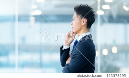 A male businessman thinking A male businessman thinking 133378295