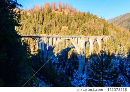 View of Wiesen Viaduct, Rhaetian railway, Graubunden in Switzerland at winter 133378328