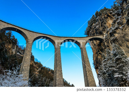 View of Landwasser Viaduct, Rhaetian railway, Graubunden in Switzerland at winter View of Landwasser Viaduct, Rhaetian railway, Graubunden in Switzerland at winter 133378332