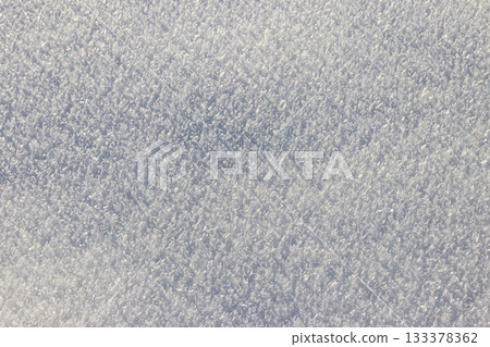 Texture of the white snow. Winter background Texture of the white snow. Winter background 133378362