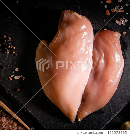 raw chicken fillet on stone background with copy space for your text raw chicken fillet on stone background with copy space for your text 133378565
