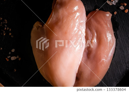 raw chicken fillet on stone background with copy space for your text 133378604