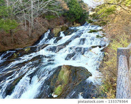 The flow of the dragon burning in autumn colors The flow of the dragon burning in autumn colors 133379364