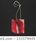 paper torn price tag and woman red lips 133379449