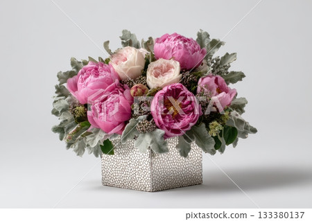 Beautiful floral arrangement with peonies and greenery Beautiful floral arrangement with peonies and greenery 133380137