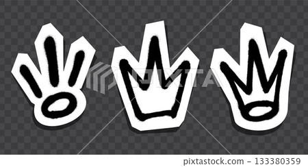 Graffiti-style black crown and symbol stickers with white outlines on dark background. Graffiti-style black crown and symbol stickers with white outlines on dark background. 133380359