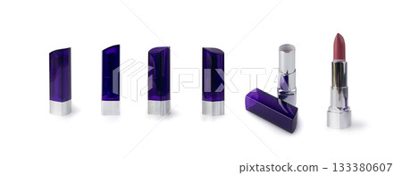 Pink lipstick in a purple tube isolated Pink lipstick in a purple tube isolated 133380607