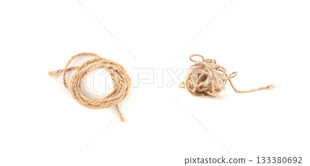 Twine rope piece isolated, jute loop fragment, beige packaging cord knots, old natural line cable Twine rope piece isolated, jute loop fragment, beige packaging cord knots, old natural line cable 133380692