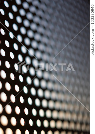 Blurred metal mesh light_vertical 133380946