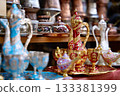 Traditional Bosnian handmade coffee sets on sale. Copper cezves, porcelain cups, and matching accessories. Bascarsija bazaar in Sarajevo. 133381399