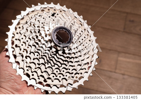 Holding Bicycle Cassette close up 133381405