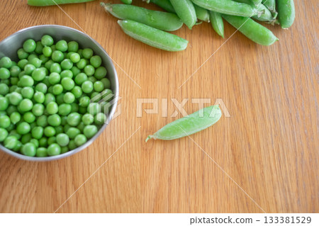 Peeling green peas Peeling green peas 133381529