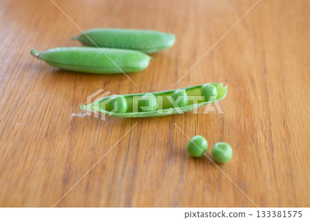 Peeling green peas Peeling green peas 133381575