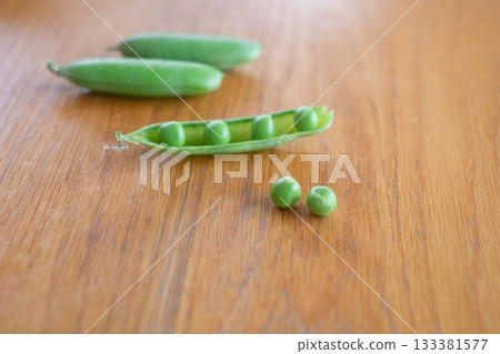 Peeling green peas Peeling green peas 133381577