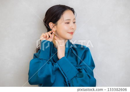 Woman in blue blouse 133382606