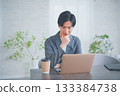A man in office casual clothes having a meeting while drinking coffee 133384738