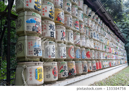 Stacked decorative Japanese sake barrels at a shrine in Tokyo, Japan Stacked decorative Japanese sake barrels at a shrine in Tokyo, Japan 133384756