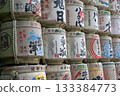 Stacked decorative Japanese sake barrels at a shrine in Tokyo, Japan 133384773