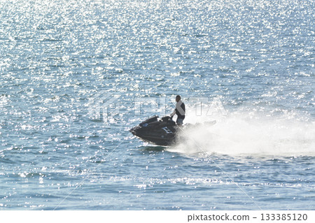August 21, 2023, Zushi and Hayama, Kanagawa Prefecture: Jet skis create sprays, waves, and roars. August 21, 2023, Zushi and Hayama, Kanagawa Prefecture: Jet skis create sprays, waves, and roars. 133385120