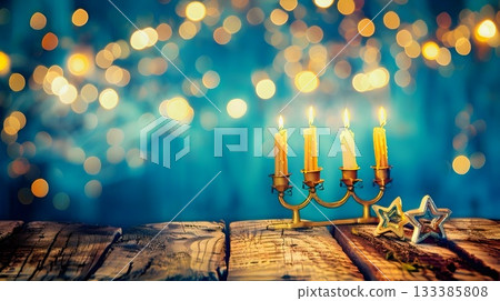 Decorative candles and stars are creating a festive Christmas ambiance against a bokeh background 133385808