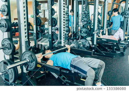 Men training in the gym Men training in the gym 133386080