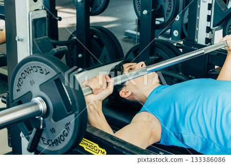 Men training in the gym 133386086